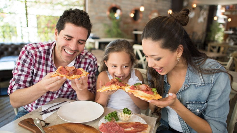 Family eating pizza